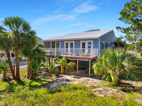 Photo of 320 Moonrise Ave, Port Saint Joe, FL 32456 (MLS # 328820)