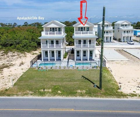 Photo of 215 W Gulf Beach Dr, Saint George Island, FL 32328 (MLS # 328115)