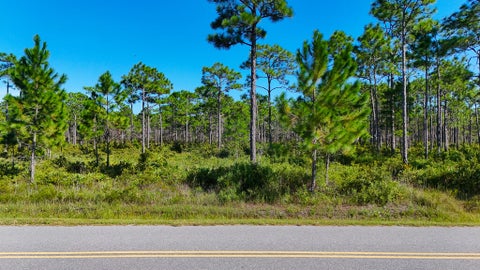 Photo of 250 Smith St, Eastpoint, FL 32328 (MLS # 329597)