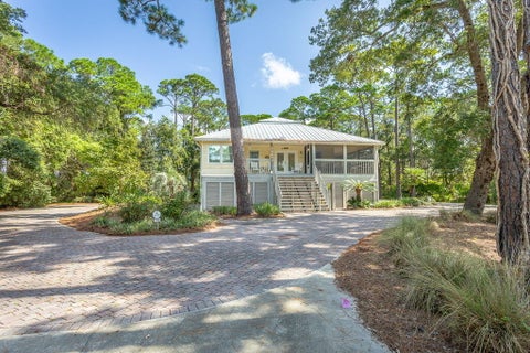 Photo of 150 S Bay Shore Dr, Eastpoint, FL 32328 (MLS # 329574)