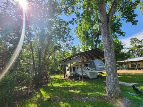 Photo of 751 Bryant Landing Rd, Wewahitchka, FL 32465 (MLS # 322153)