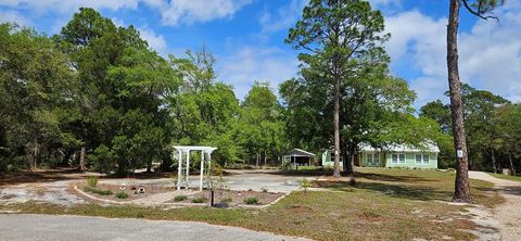 Photo of 231 Apalachee St, Carrabelle, FL 32322 (MLS # 327946)
