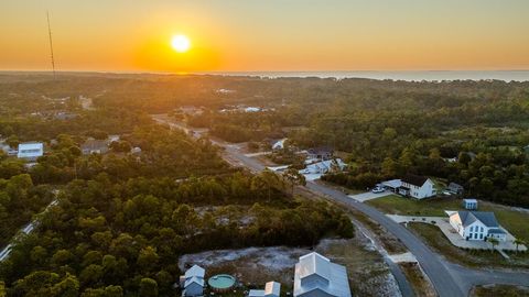 Photo of 267 Ridgecrest Pkwy, Eastpoint, FL 32328 (MLS # 324198)