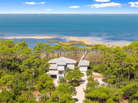 Photo of 1725 E Gulf Beach Dr, Saint George Island, FL 32328 (MLS # 324429)