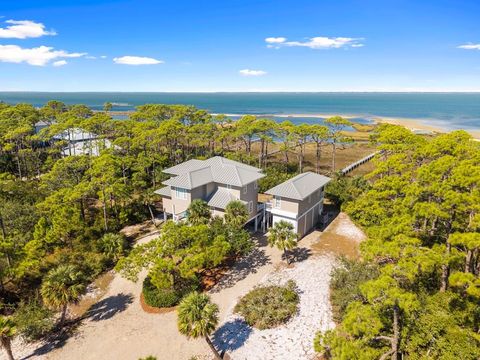 Photo of 1725 E Gulf Beach Dr, Saint George Island, FL 32328 (MLS # 324429)