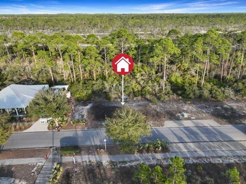Photo of 504 Tide Water Dr, Port Saint Joe, FL 32456 (MLS # 321264)