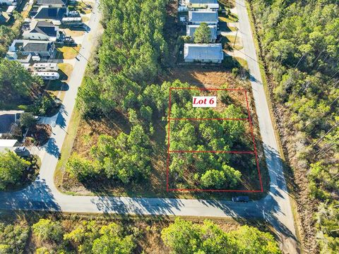 Photo of 912 NE 5th St, Carrabelle, FL 32322 (MLS # 320570)