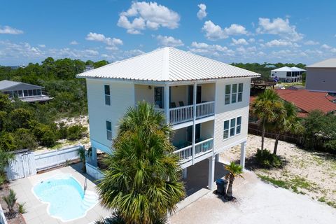 Photo of 517 W Gulf Beach Dr, Saint George Island, FL 32328 (MLS # 322674)