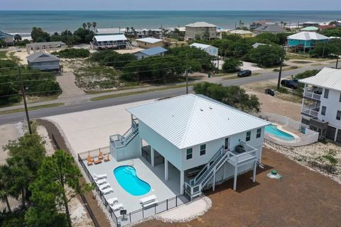 Photo of 941 W Gulf Beach Dr, Saint George Island, FL 32328 (MLS # 324340)