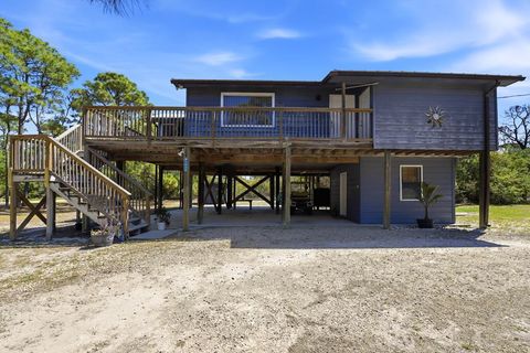 Photo of 1048 W Bay Shore Dr, Saint George Island, FL 32328 (MLS # 328143)