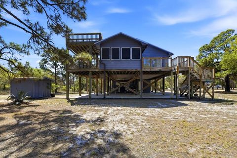 Photo of 1048 W Bay Shore Dr, Saint George Island, FL 32328 (MLS # 328143)