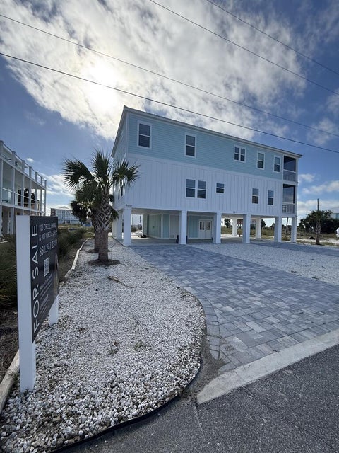 Photo of 107 Circle Dr, Mexico Beach, FL 32456 (MLS # 328493)