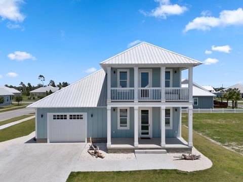 Photo of 112 St Frances St, Mexico Beach, FL 32456 (MLS # 323938)