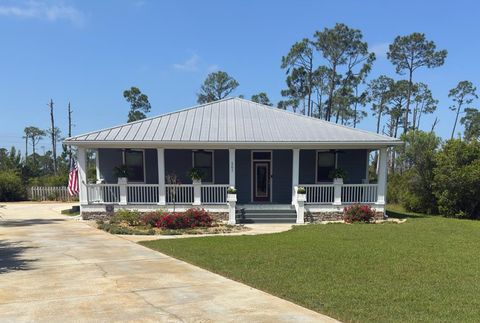 Photo of 207 Sting Ray Ln, Port Saint Joe, FL 32456 (MLS # 327959)