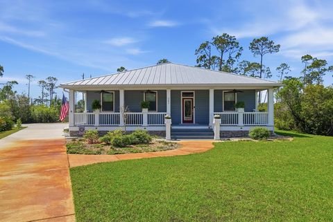 Photo of 207 Sting Ray Ln, Port Saint Joe, FL 32456 (MLS # 327959)