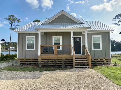 Photo of 153 Lake McKissack Ln, Carrabelle, FL 32322 (MLS # 327759)