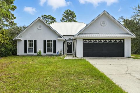Photo of 118 Las Brisas Way, Eastpoint, FL 32328 (MLS # 324032)