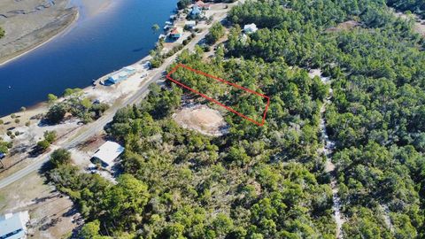 Photo of 264 River Rd, Carrabelle, FL 32322 (MLS # 325155)