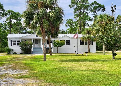 Photo of 216 Whiting St, Port Saint Joe, FL 32456 (MLS # 320469)