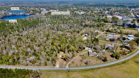 Photo of 703 W River Rd, Wewahitchka, FL 32465 (MLS # 327805)