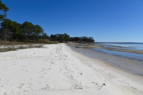 Photo of 19 S Bay Shore Dr, Eastpoint, FL 32328 (MLS # 324441)