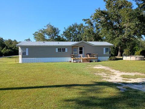 Photo of 1220 Stone Mill Creek Rd, Wewahitchka, FL 32465 (MLS # 323903)
