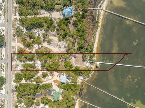 Photo of 1805 E Gulf Beach Dr, Saint George Island, FL 32328 (MLS # 328409)