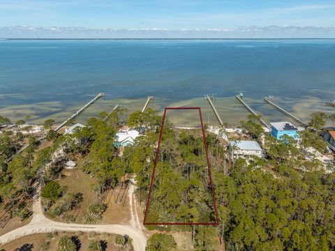 Photo of 1207 E Gulf Beach Dr, Saint George Island, FL 32328 (MLS # 326384)