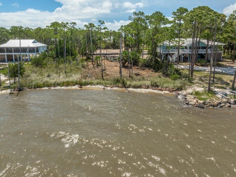 Photo of 1207 E Gulf Beach Dr, Saint George Island, FL 32328 (MLS # 326384)