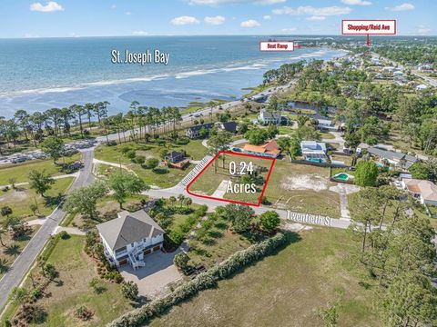 Photo of 100 Sunset Cir, Port Saint Joe, FL 32456 (MLS # 321729)