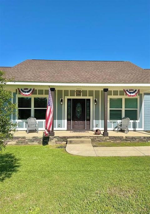 Photo of 12634 NW Twin Oaks Dr, Bristol, FL 32321 (MLS # 323966)
