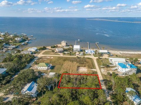 Photo of 308 Quinn St, Saint George Island, FL 32328 (MLS # 321176)