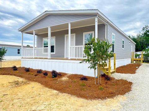 Photo of 124 Meadow Ln, Wewahitchka, FL 32465 (MLS # 324394)