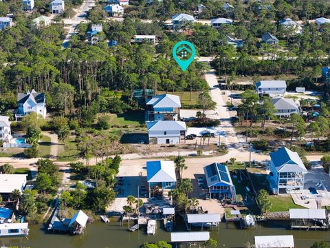 Photo of 305 Palmer St, Saint George Island, FL 32328 (MLS # 321382)
