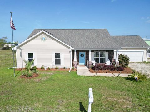 Photo of 415 Texas Dr, Mexico Beach, FL 32456 (MLS # 327905)