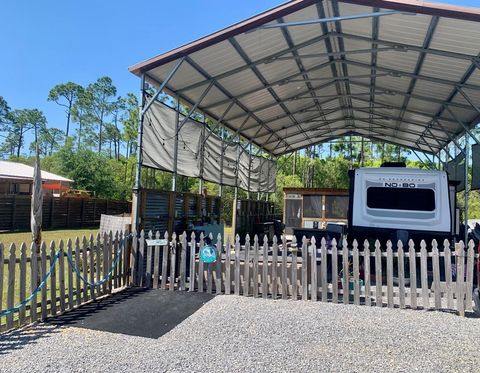 Photo of 161 Dancing Moon Ln, Port Saint Joe, FL 32456 (MLS # 320424)
