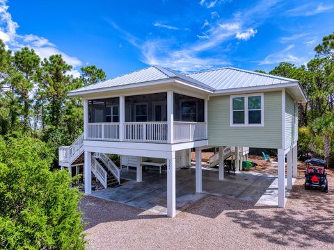 Photo of 327 Nedley St, Saint George Island, FL 32328 (MLS # 323806)