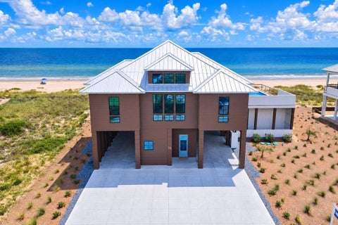 Photo of 716 E Gorrie Dr, Saint George Island, FL 32328 (MLS # 329496)