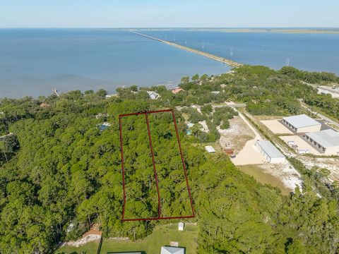 Photo of 46 S Bay Shore Dr, Eastpoint, FL 32328 (MLS # 324061)