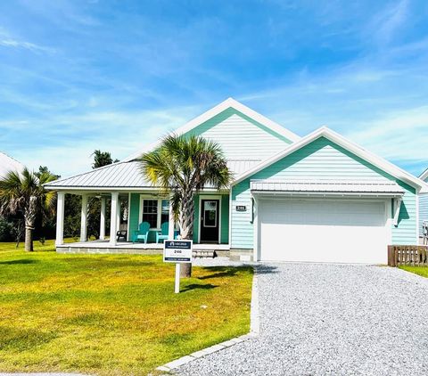 Photo of 246 Lalla Ln, Mexico Beach, FL 32456 (MLS # 324562)