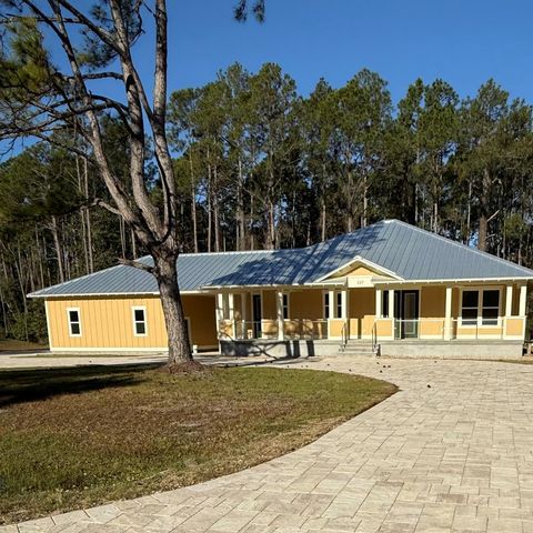 Photo of 227 Boncycle Land Dr, Eastpoint, FL 32328 (MLS # 325082)