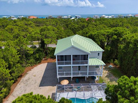 Photo of 1701 Kingfisher Rd, Saint George Island, FL 32328 (MLS # 321302)