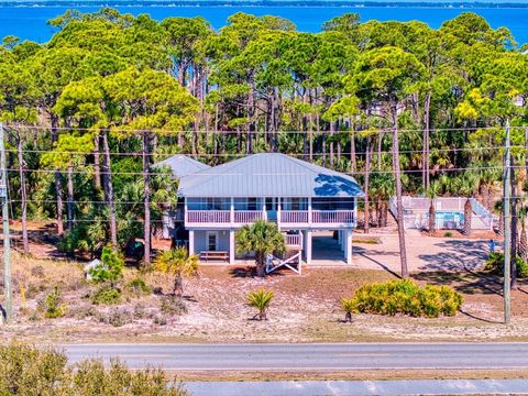 Photo of 1105 E Gulf Beach Dr, Saint George Island, FL 32328 (MLS # 327835)