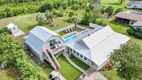 Photo of 78 1st St, Mexico Beach, FL 32456 (MLS # 326533)