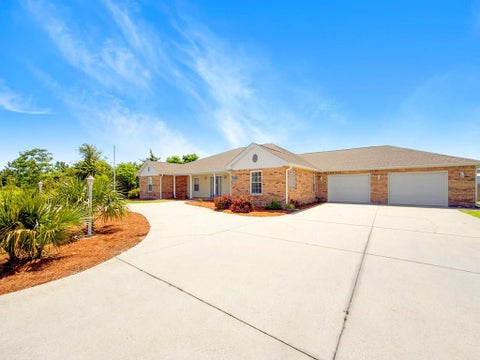 Photo of 402 Texas Dr, Mexico Beach, FL 32456 (MLS # 329084)