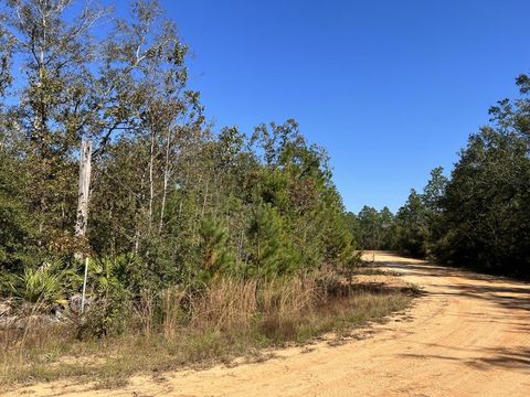 Photo of LOT 9 Arches Cir, Alford, FL 32420 (MLS # 323820)