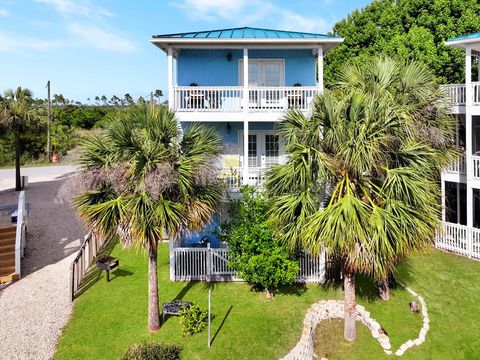 Photo of 107 N 32nd St, Mexico Beach, FL 32456 (MLS # 328325)