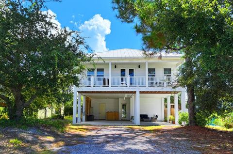 Photo of 240 Pebble Beach Ave, Port Saint Joe, FL 32456 (MLS # 324245)