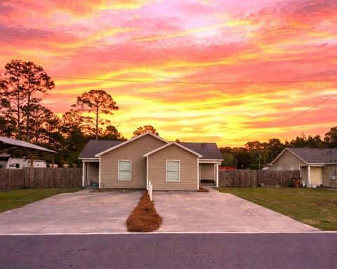 Photo of 734 Jones Homestead Rd, Port Saint Joe, FL 32456 (MLS # 327872)