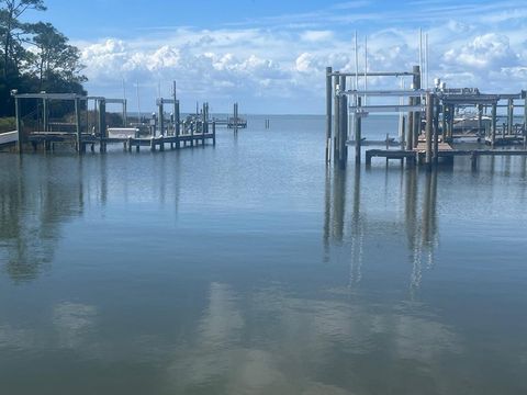 Photo of 527 W Sawyer St, Saint George Island, FL 32328 (MLS # 324310)